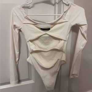 White Fox Boutique Cream Cutout Long Sleeve Bodysuit